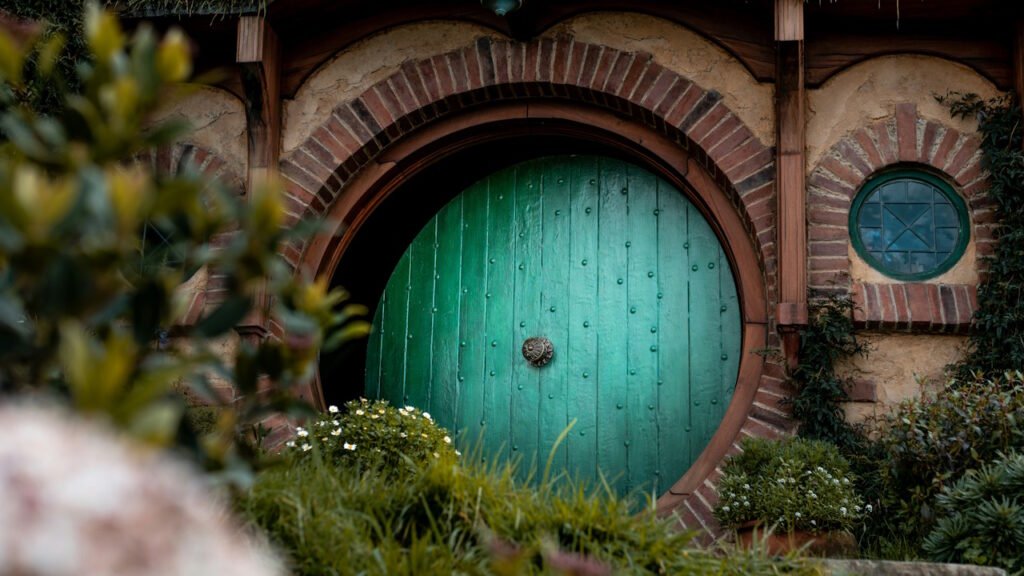 A picture of a hobbit door in the shire.