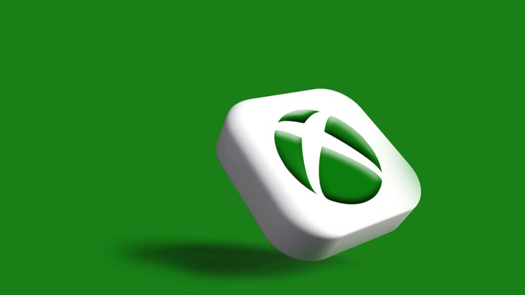 An Xbox logo against a gren background. 